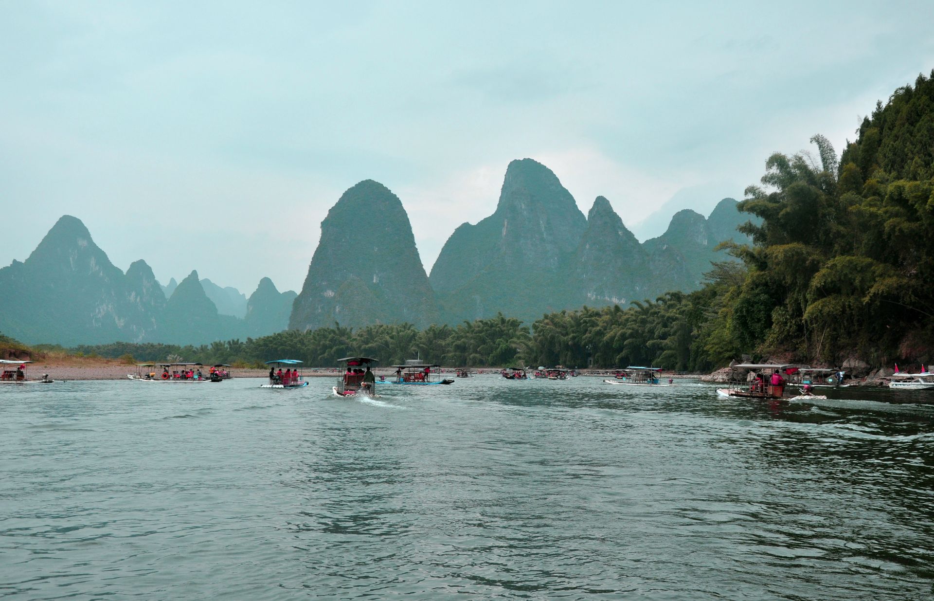 Bamboo raft with passengers drifting on the Li River