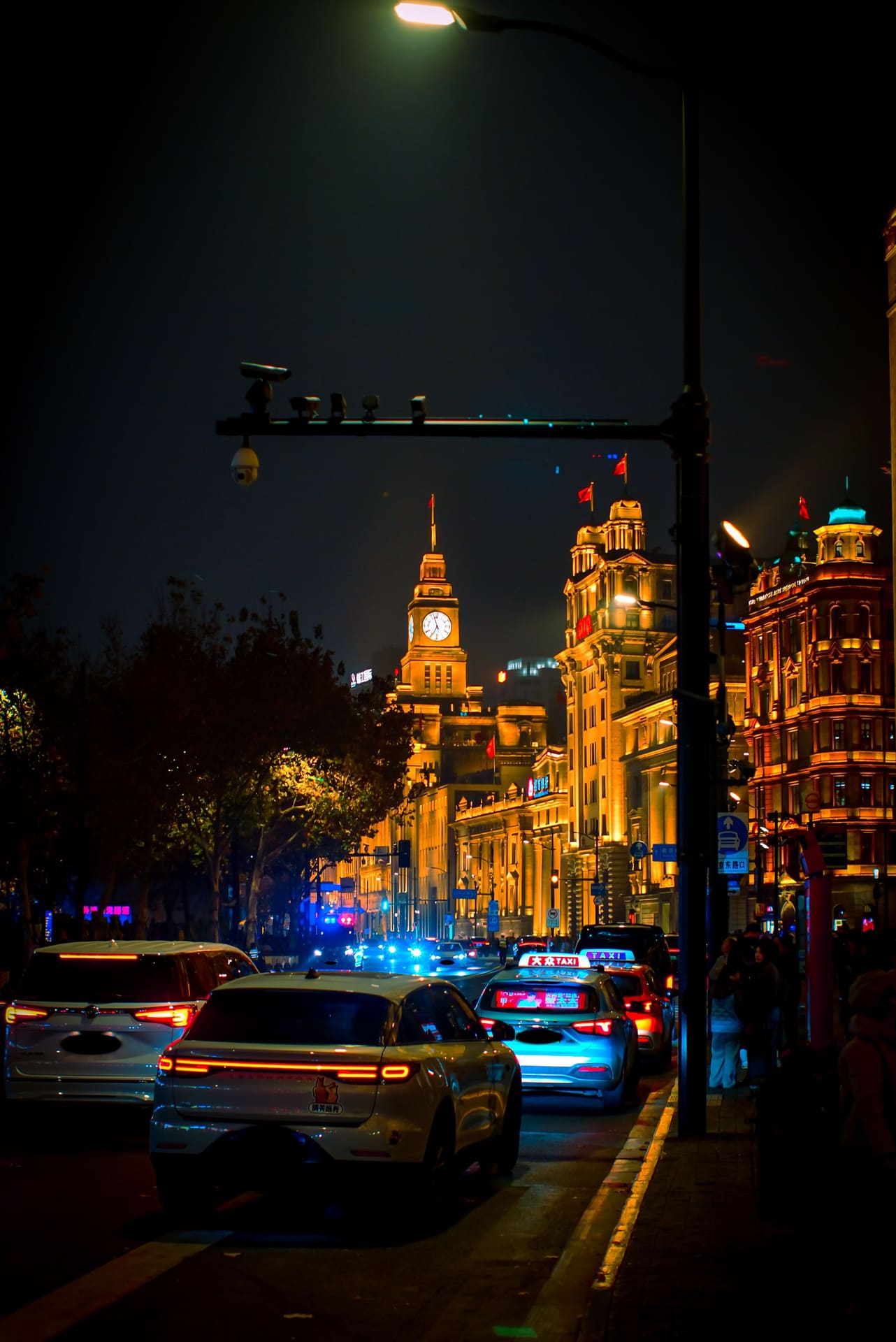 Neon-lit street in Shanghai at night