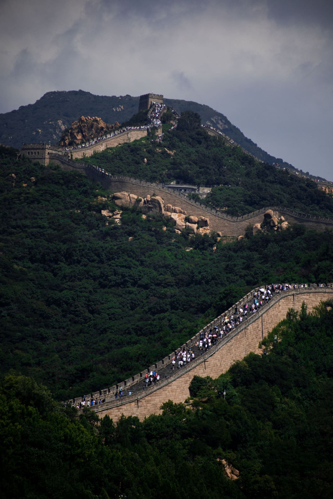 Great Wall watchtower against mountain backdrop